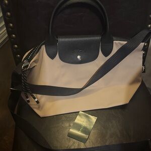 Longchamp Tote in Black and Tan Prefect condition used once. Love the brand!